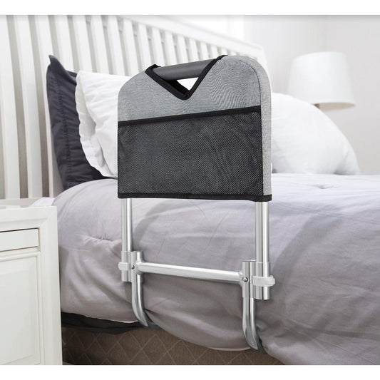 Compact bed rail with bag.